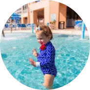 toddler plays in the pool at our kid-friendly resort in Florida