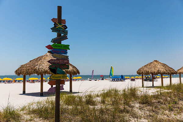 Signs leading to Pink Shell's private beach in Fort Myers