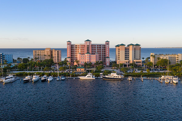 Aerial view of Pink Shell Resort, the bay and award-winning marina in Fort Myers Beach